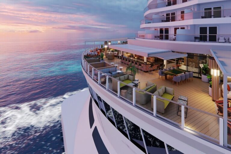 Luxury yacht deck at sunset with outdoor lounge, dining tables, and seating overlooking calm ocean waters.