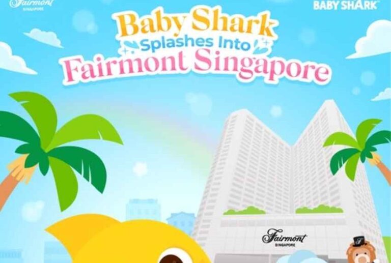 Bright illustration advertising Baby Shark splashes into Fairmont Singapore, with palm trees and the Fairmont hotel in the background; banner text reads 'Baby Shark Splashes Into Fairmont Singapore'