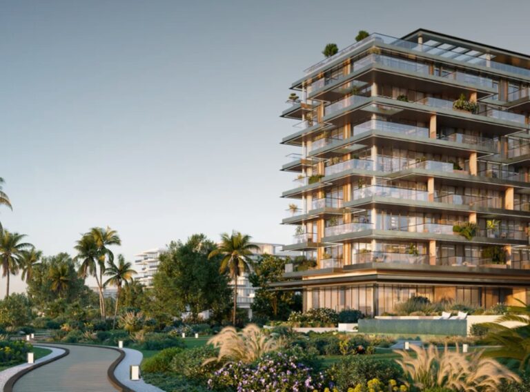 Modern glass-front residential building with stacked balconies, overlooking a lush tropical garden and curved pedestrian walkway.