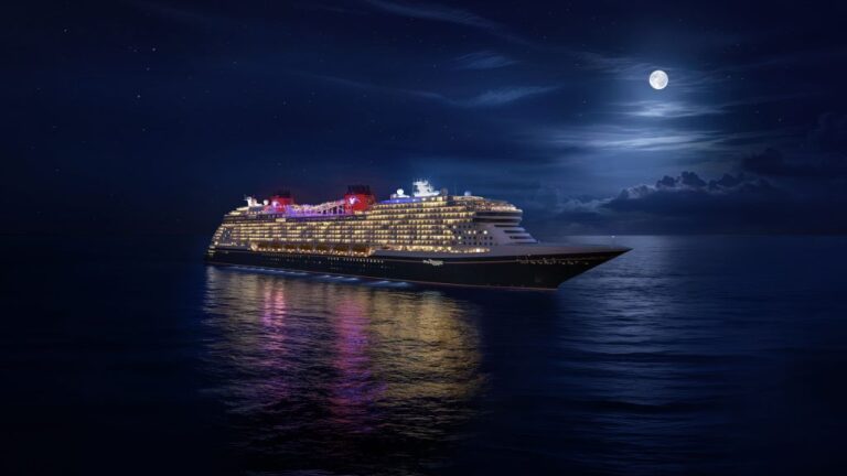 Nighttime ocean scene with a large illuminated cruise ship sailing on calm dark water beneath a bright full moon, reflections on the surface.