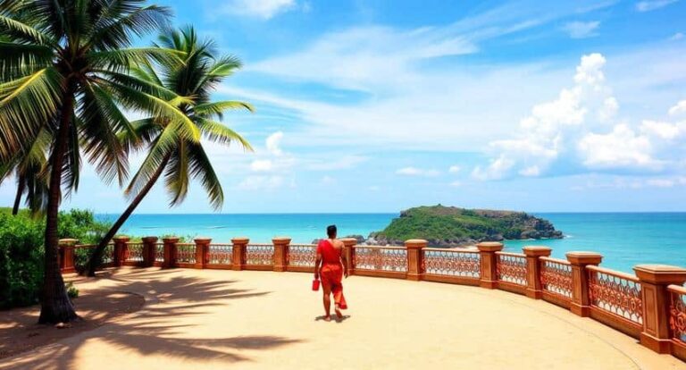 Person in red shorts walks along a curved seaside promenade with palm trees and turquoise ocean in the background.