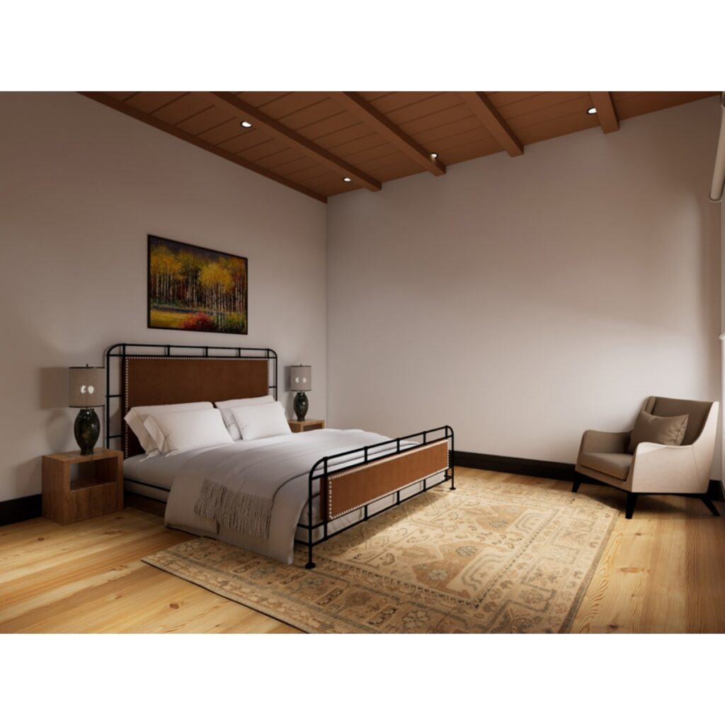 Cozy modern bedroom with a metal-framed bed, two nightstands, lamps, and a beige armchair on a patterned rug.