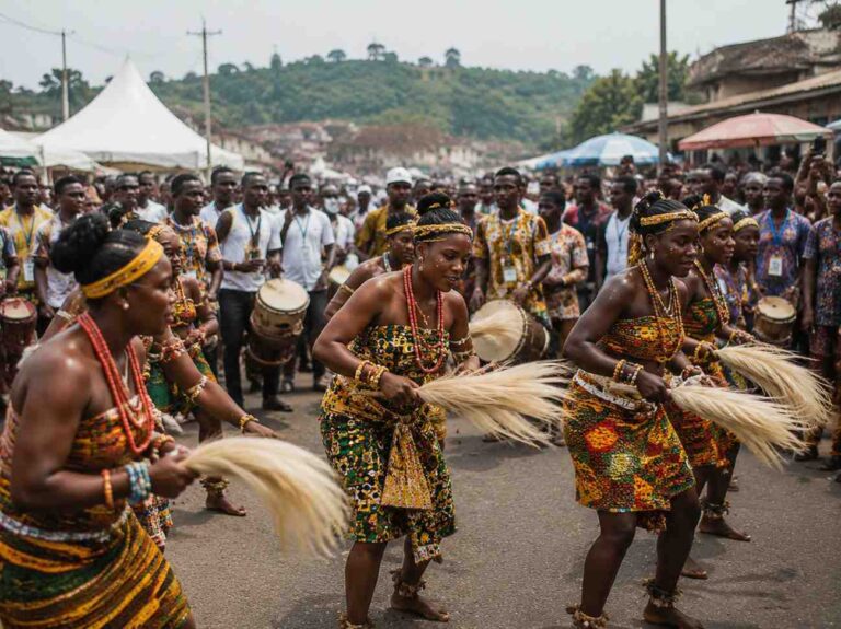 Group of dancers in colorful traditional attire performing a street festival, holding palm fronds
