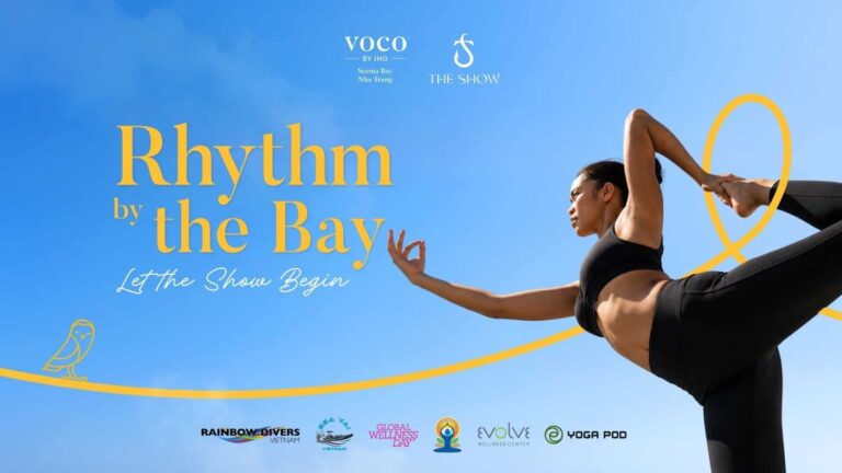 Promotional banner for Rhythm by the Bay with a woman in black athletic wear performing a yoga pose against a clear blue sky, and the text 'Rhythm by the Bay'.