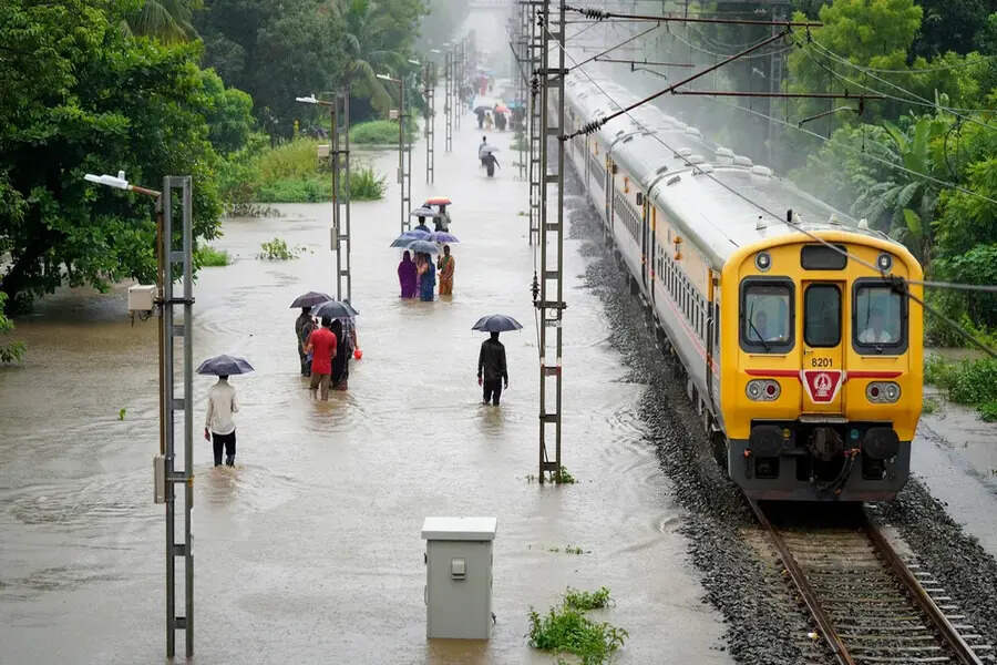 India’s Monsoon Travel Chaos Intensifies as Mumbai Records Over 200mm Rainfall, Flooded Streets Disrupt Journeys, Suburban Trains Halt and City Mobility Crumbles Under Heavy Downpour Fury